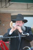 Regional Director of Chabad of illinois, Rabbi Daniel Moskowitz blows the Shofar